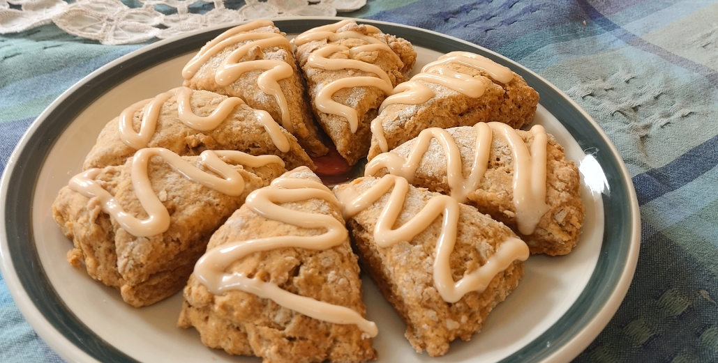 These iced pumpkin spiced scones drizzled with a sweet cream cheese glaze will grace any autumn table.
